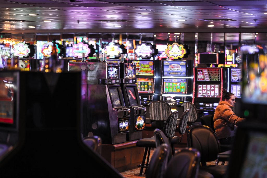 A photo of slot machines inside a casino.