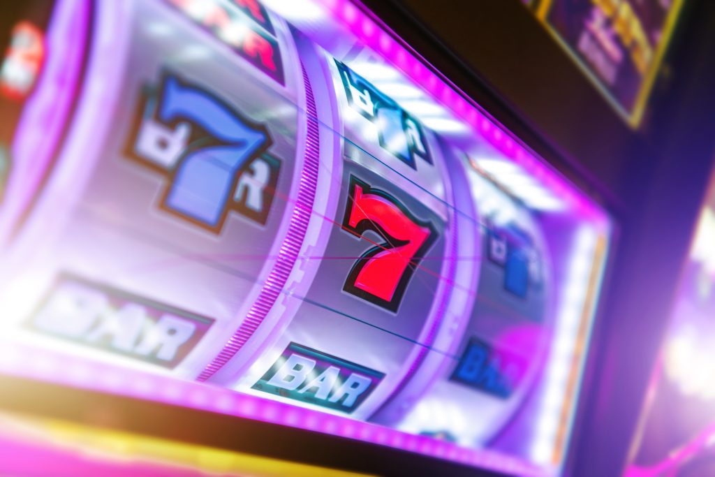 A photo of a slot machine display that shows different symbols.