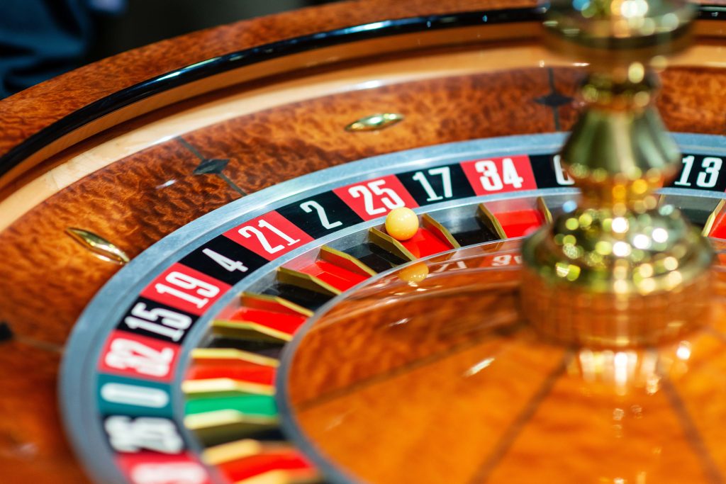 A photo of a ball on a roulette wheel.