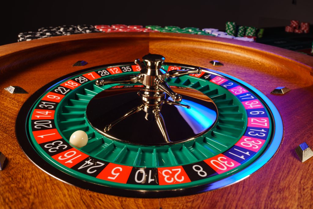 A close up photo of a roulette wheel.