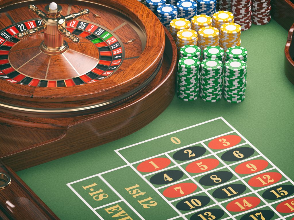 A photo of a roulette wheel and table.