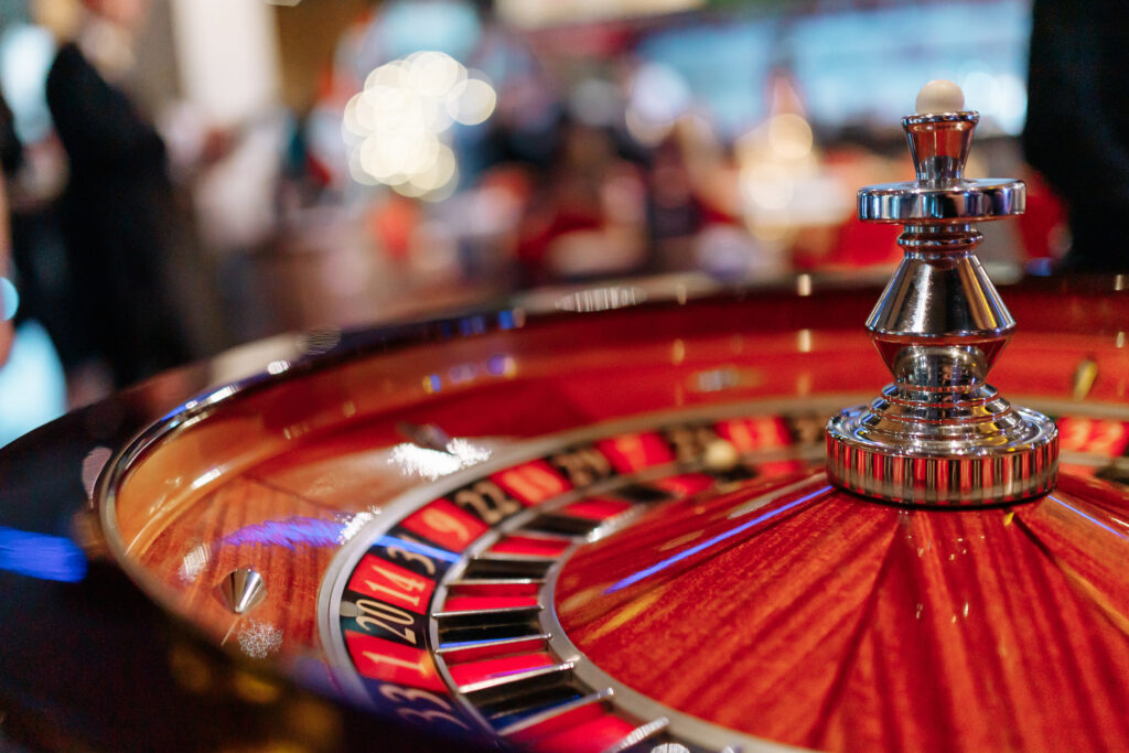 Close up of a roulette wheel in a casino.