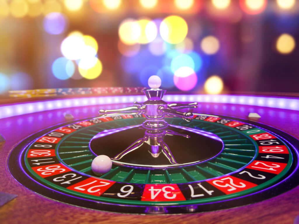 Close up of a roulette wheel at a casino.