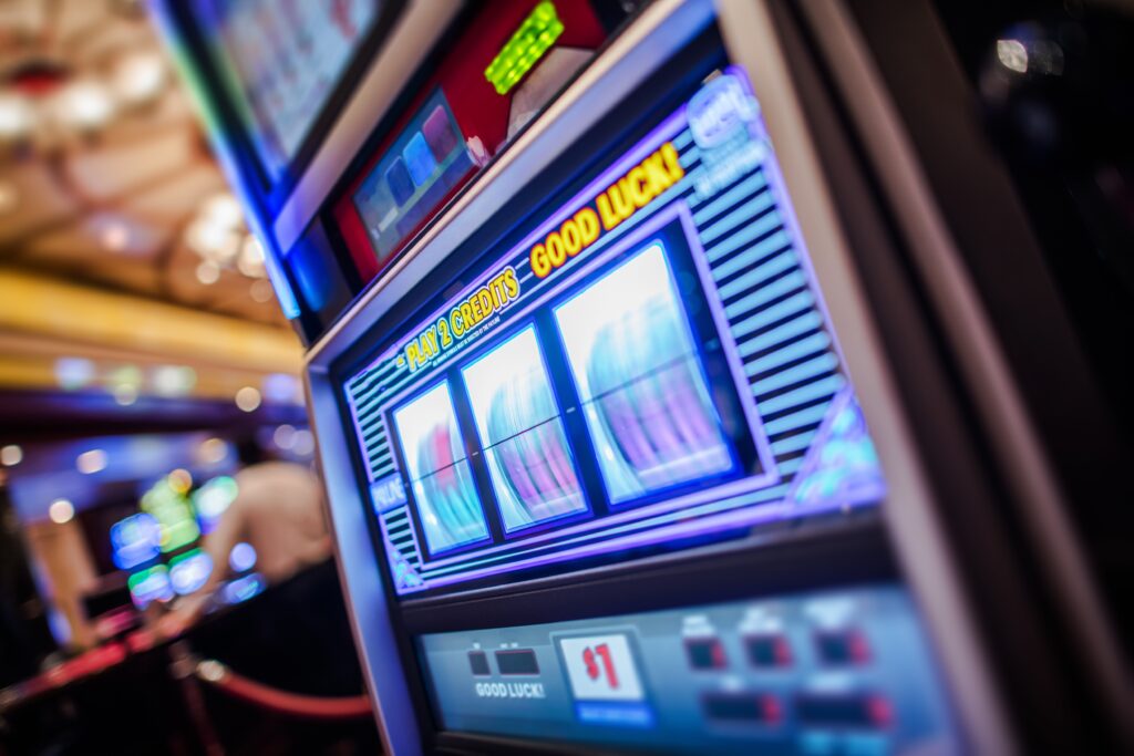 Slot machine with spinning reels.